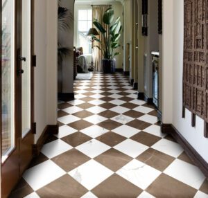 Calacatta and AmaniBronze marble-look tiled foyer