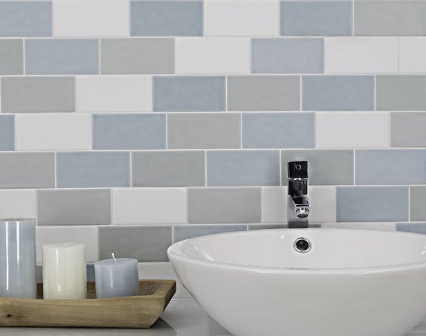 Tiled bathroom wall in soft neutral colors