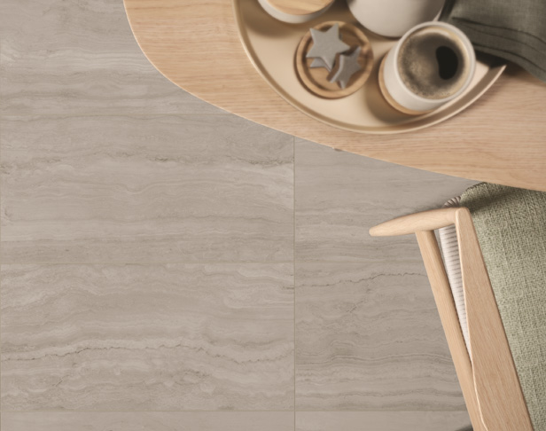 Ivory travertine porcelain tiled floor with Scandinavian styled dining table and chair