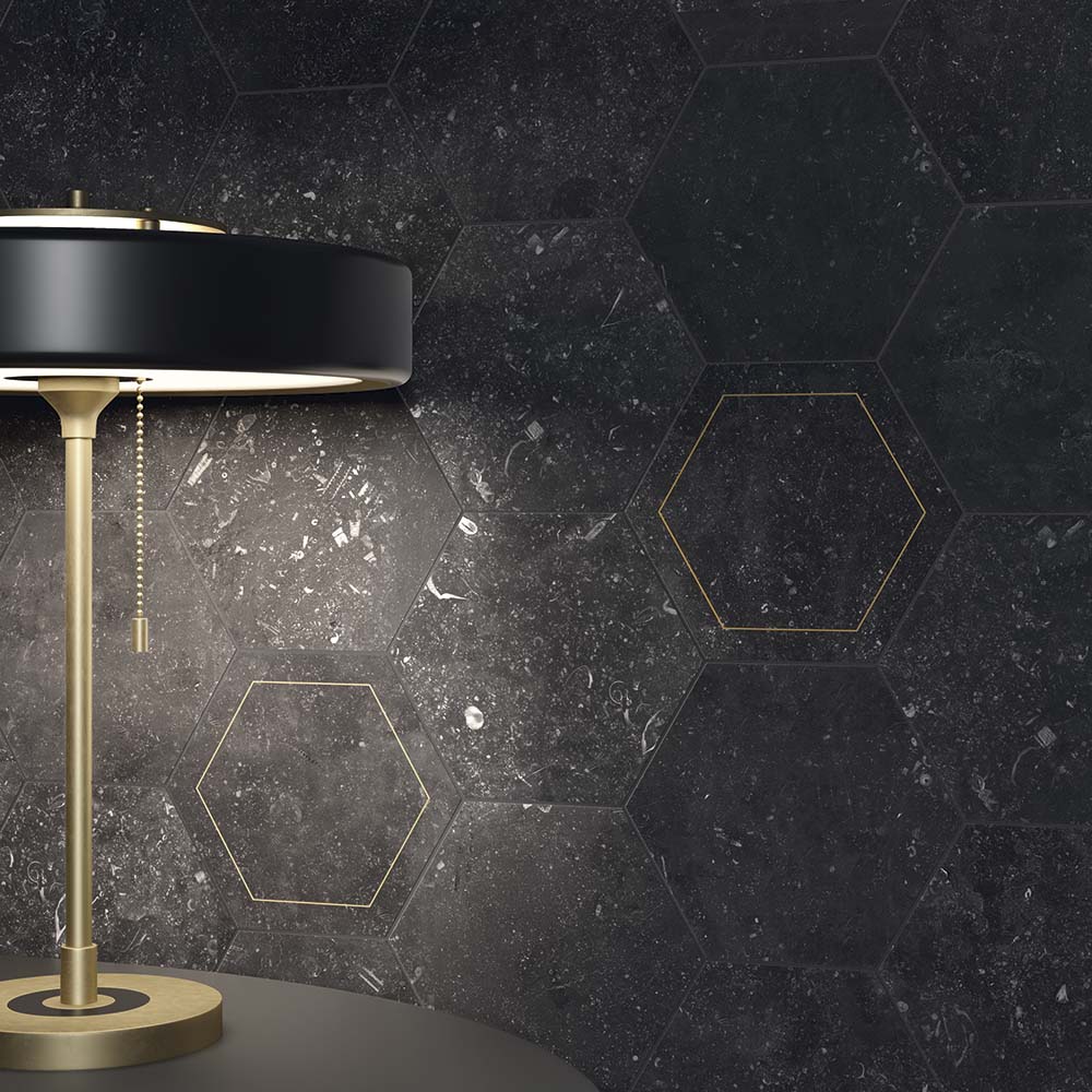 Belgica Due black marble-loo hexagon wall tiles mixed with Belgica Due deco gold trimmed hexagon tiles