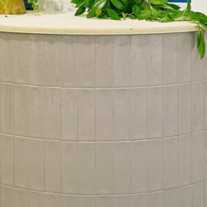 Beige rectangular tiled counter wall