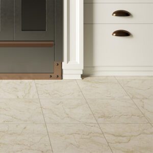 Square Ivory marble tiled kitchen floor with gray range and white cabinets