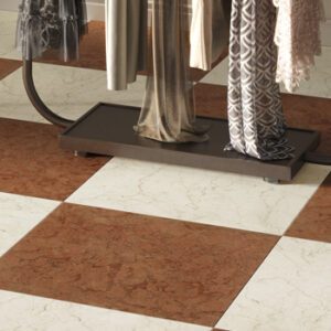 Large red marble tiled floor in a checkerboard pattern with white marble tiles