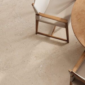 beige fossilized floor tiles on a kitchen floor with dinette