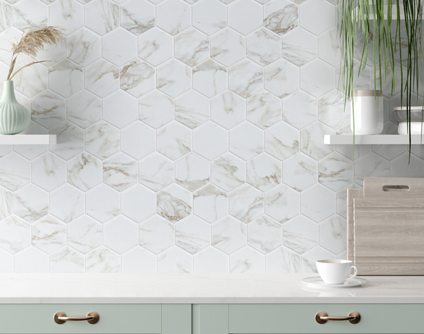 White marble look hexagon tiled backsplash
