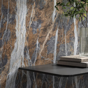 Gold, brown, and gray marble look large format tiled wall