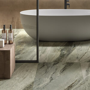 Large format green marble look tiled bathroom floor