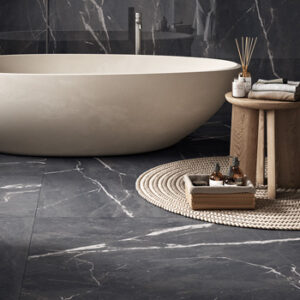 Large format black and white marble look tiled bathroom floor