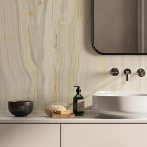 arge format pale green marble look tiled bathroom with wall mount faucet and white vessel sink and mirro