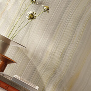 arge format pale green marble look tiled wall with dried flowers