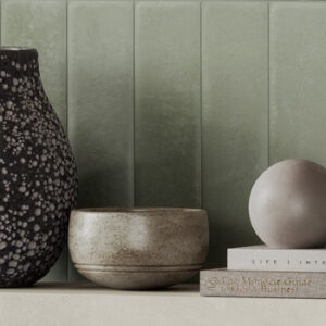green small format tiled wall with vase, bowl, and ball