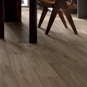 gray beige wood look tiled kitchen floor with dark wood table and chair