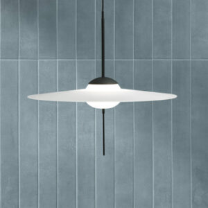 blue narrow tiled wall with modern pendant lamp
