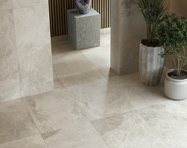Pale gray quartzite look porcelain tiled floor with planters