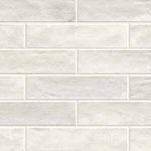 White 3x12 glossy tiles in a brickjoint pattern