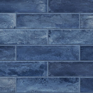 Blue 3x12 glossy tiles in a brickjoint pattern
