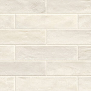 Ivory 3x12 glossy tiles in a brickjoint pattern