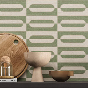 beige and green oval mosaic tiled kitchen backsplash with cutting board and bowls