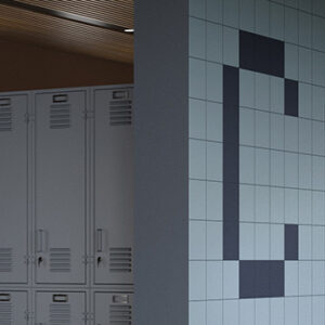 powder blue 8x8 tiled wall and dark blue tiles in the shape of the letter c
