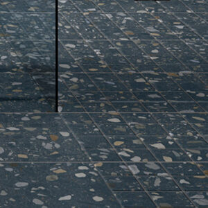 blue terrazzo look porcelain mosaic tiles installed on a shower floor