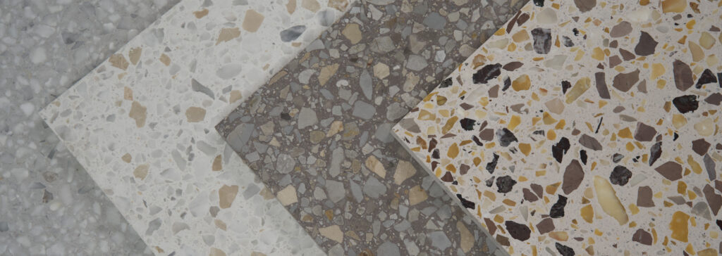 Neutral colors of terrazzo tile placed diagonally on top of one another